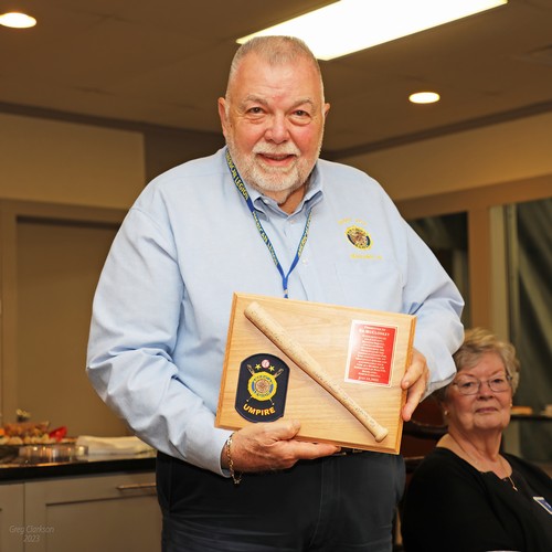 Immediate Past Commander Ed McCloskey and plaque.